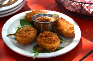 Fried deviled eggs on a plate