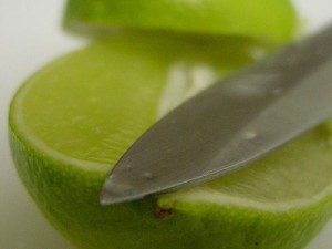 Sliced lime with knife