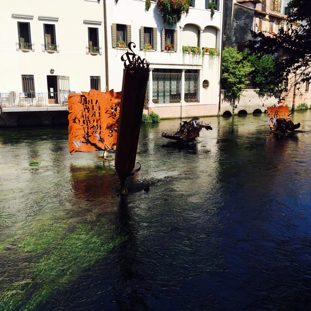 The river sculptures near the restaurant patio